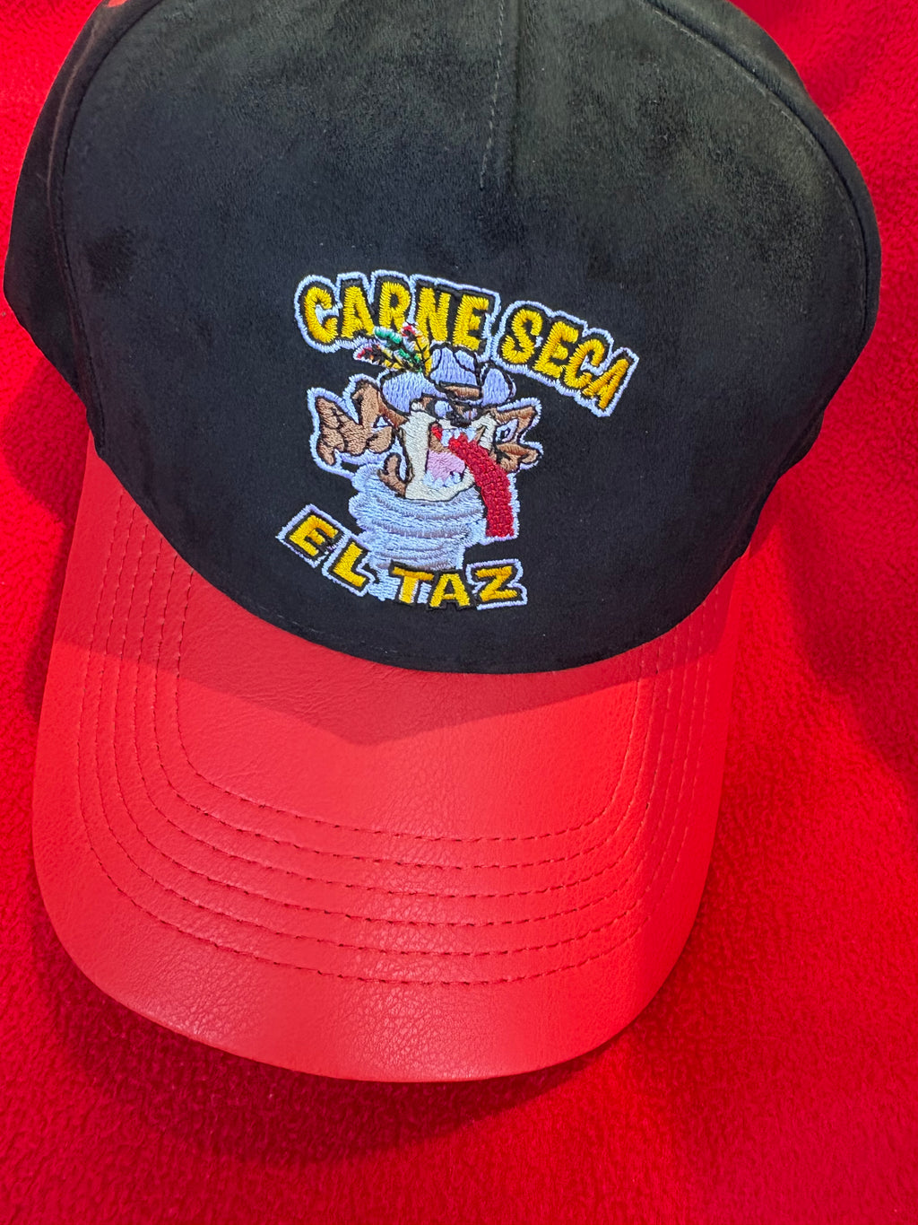 Black suede with red leather